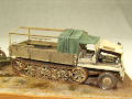 Diorama with plastic models of the German sWS half-track vehicle and sFH 18 heavy howitzer - photo no 5