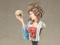 Link to photos of a resin bust of a woman with a skull in her hand entitled Alas