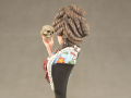 A resin bust of a woman with a skull in her hand entitled Alas - photo no 3