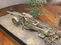 A diorama with a plastic model of the Kanone 18 German heavy gun standing on a crossroads in Berlin after WW2 - photo no 4