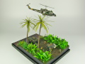 Diorama featuring a damaged M113 armored personnel carrier towing by an elephant and the Bell UH-1B helicopter flying over them - photo No. 4