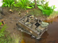 Diorama featuring a damaged M113 armored personnel carrier towing by an elephant and the Bell UH-1B helicopter flying over them - photo No. 11