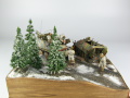 Photos shows Ardennes Offensive 1944 diorama being made in scale 1:35. The diorama includes two plastic models of German vehicles: Grille Ausf. H and Sd.Kfz. 251 Ausf.D - photo No. 7