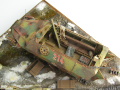 Photos shows Ardennes Offensive 1944 diorama being made in scale 1:35. The diorama includes two plastic models of German vehicles: Grille Ausf. H and Sd.Kfz. 251 Ausf.D - photo No. 12