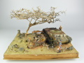 Link to photos of a diorama showing a destroyed Panzer IV standing on the outskirts of Tobruk in 1941.