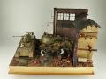 The World War II diorama features two plastic models of armored vehicles made in 1:35 scale. These models are: an anti-aircraft gun placed on the chassis of the Panthera tank and the VK 72.01(K) Löwe tank - photo No. 1