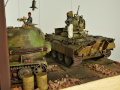 The World War II diorama features two plastic models of armored vehicles made in 1:35 scale. These models are: an anti-aircraft gun placed on the chassis of the Panthera tank and the VK 72.01(K) Löwe tank - photo No. 10