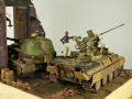 The World War II diorama features two plastic models of armored vehicles made in 1:35 scale. These models are: an anti-aircraft gun placed on the chassis of the Panthera tank and the VK 72.01(K) Löwe tank - photo No. 11