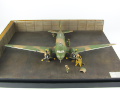 The photo shows a plastic model of the American AC-47 Spooky air support aircraft from the Vietnam War period. Photo No. 1