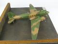 The photo shows a plastic model of the American AC-47 Spooky air support aircraft from the Vietnam War period. Photo No. 7