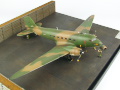 The photo shows a plastic model of the American AC-47 Spooky air support aircraft from the Vietnam War period. Photo No. 8