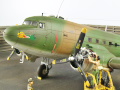 The photo shows a plastic model of the American AC-47 Spooky air support aircraft from the Vietnam War period. Photo No. 10