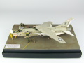 The photo shows a plastic model of the American single-seat F-8E Crusader carrier-based fighter aircraft assembled on a 1:72 scale. The model represents the F-8E aircraft from times of the Vietnam War. Photo No. 1