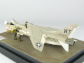 The photo shows a plastic model of the American single-seat F-8E Crusader carrier-based fighter aircraft assembled on a 1:72 scale. The model represents the F-8E aircraft from times of the Vietnam War. Photo No. 3