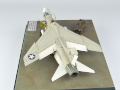 The photo shows a plastic model of the American single-seat F-8E Crusader carrier-based fighter aircraft assembled on a 1:72 scale. The model represents the F-8E aircraft from times of the Vietnam War. Photo No. 4