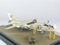 The photo shows a plastic model of the American single-seat F-8E Crusader carrier-based fighter aircraft assembled on a 1:72 scale. The model represents the F-8E aircraft from times of the Vietnam War. Photo No. 7