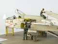 The photo shows a plastic model of the American single-seat F-8E Crusader carrier-based fighter aircraft assembled on a 1:72 scale. The model represents the F-8E aircraft from times of the Vietnam War. Photo No. 11