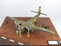 The photo shows a scale plastic model of the C-7A Caribou cargo plane glued together in a 1:72 scale - photo No. 1