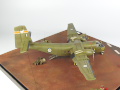 The photo shows a scale plastic model of the C-7A Caribou cargo plane glued together in a 1:72 scale - photo No. 6