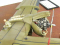 The photo shows a scale plastic model of the C-7A Caribou cargo plane glued together in a 1:72 scale - photo No. 10