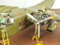 The photo shows a scale plastic model of the C-7A Caribou cargo plane glued together in a 1:72 scale - photo No. 11