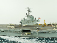 The plastic model of the USS Intrepid aircraft carrier.