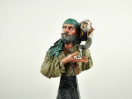 Resin model bust of a pirate with a monkey.